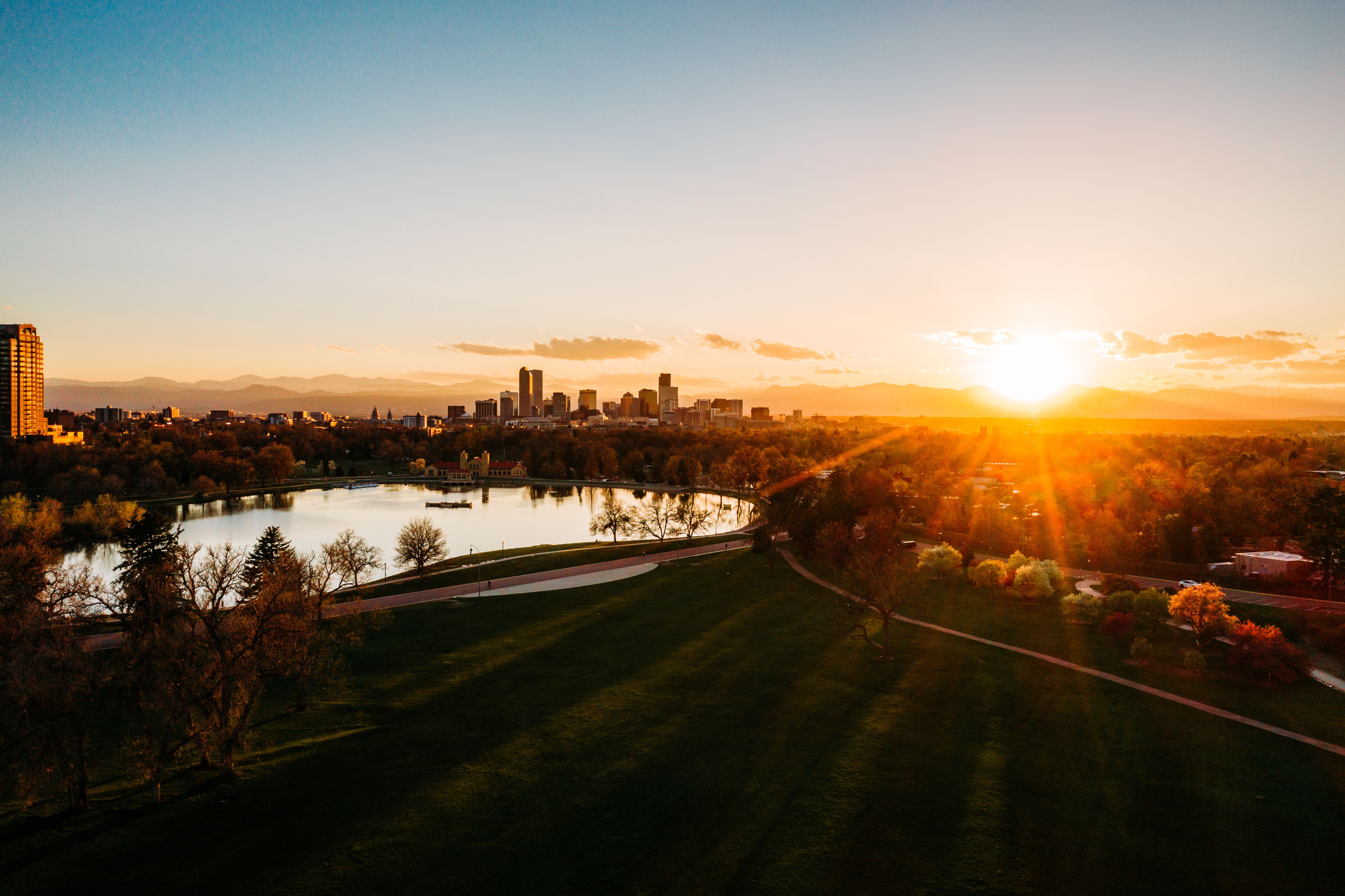 City Park and downtown Denver skyline at sunset